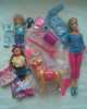 nová Barbie panenka s dětmi a pejskem, kočičkou, nově ručně ušité různé oblečení na panenky, zdarma kočárek, vše uloženo v novém dětském kufříku, možno přidat i Kena s pejskem a oblečením 1600,-
